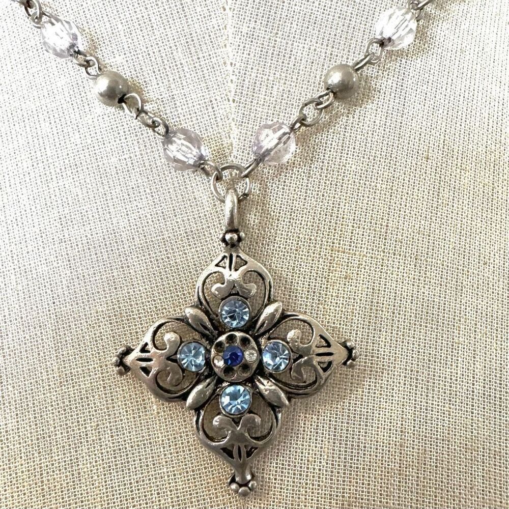 Silver tone and blue rhinestone pendant necklace
